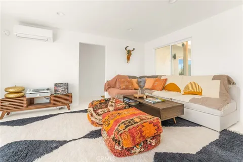 a bed room with a bed and a couch