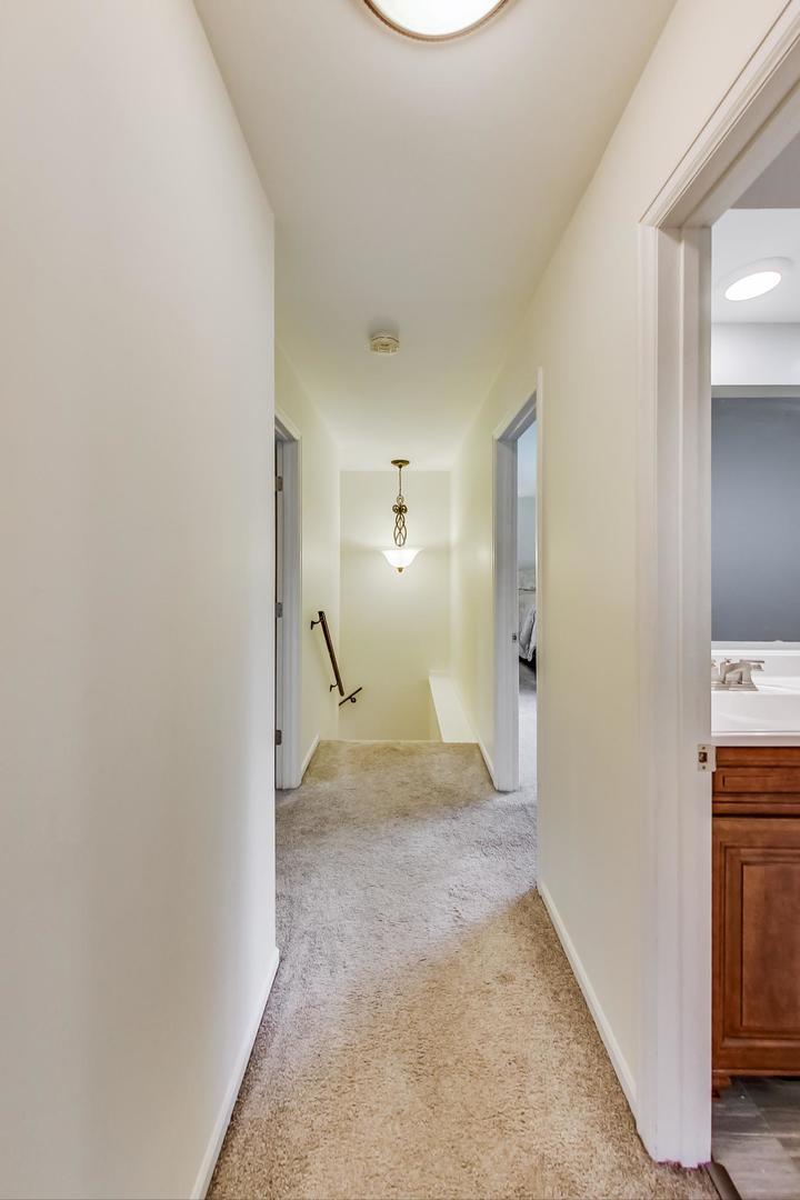 2210 Freeman Court Inverness, IL 60067 - Photo 22 of 56 a view of a big room with wooden floor