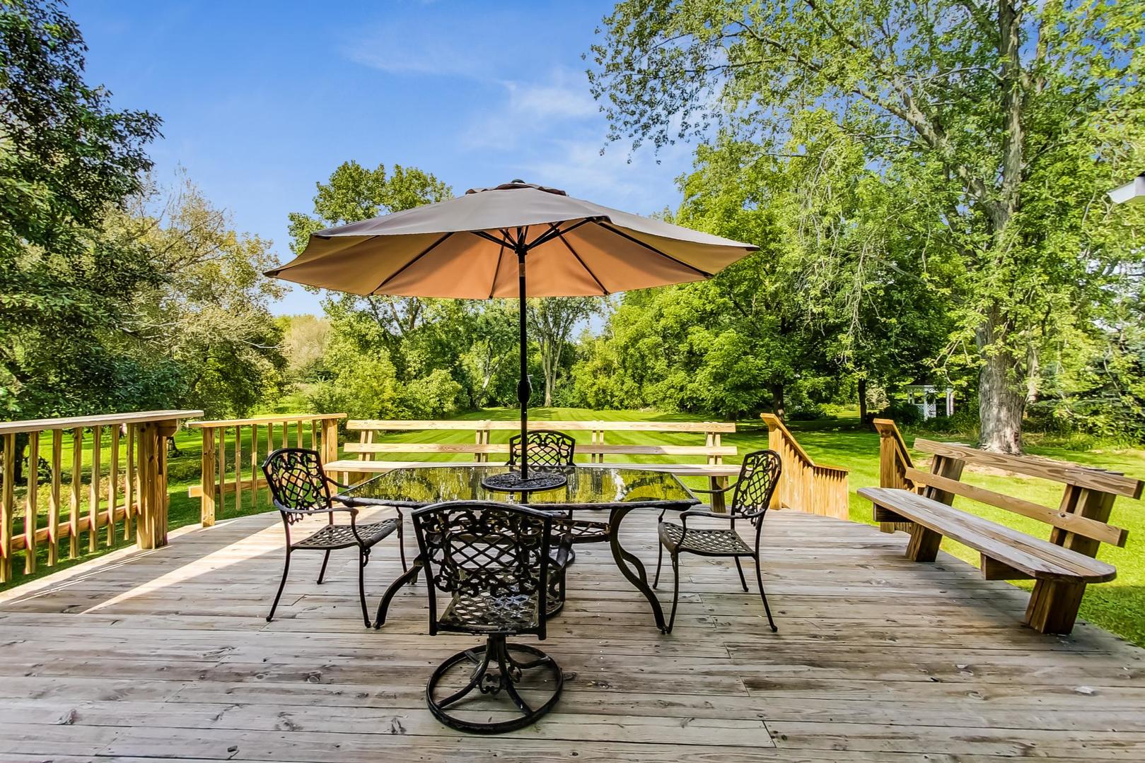 2210 Freeman Court Inverness, IL 60067 - Photo 47 of 56 an outdoor space with furniture and umbrella