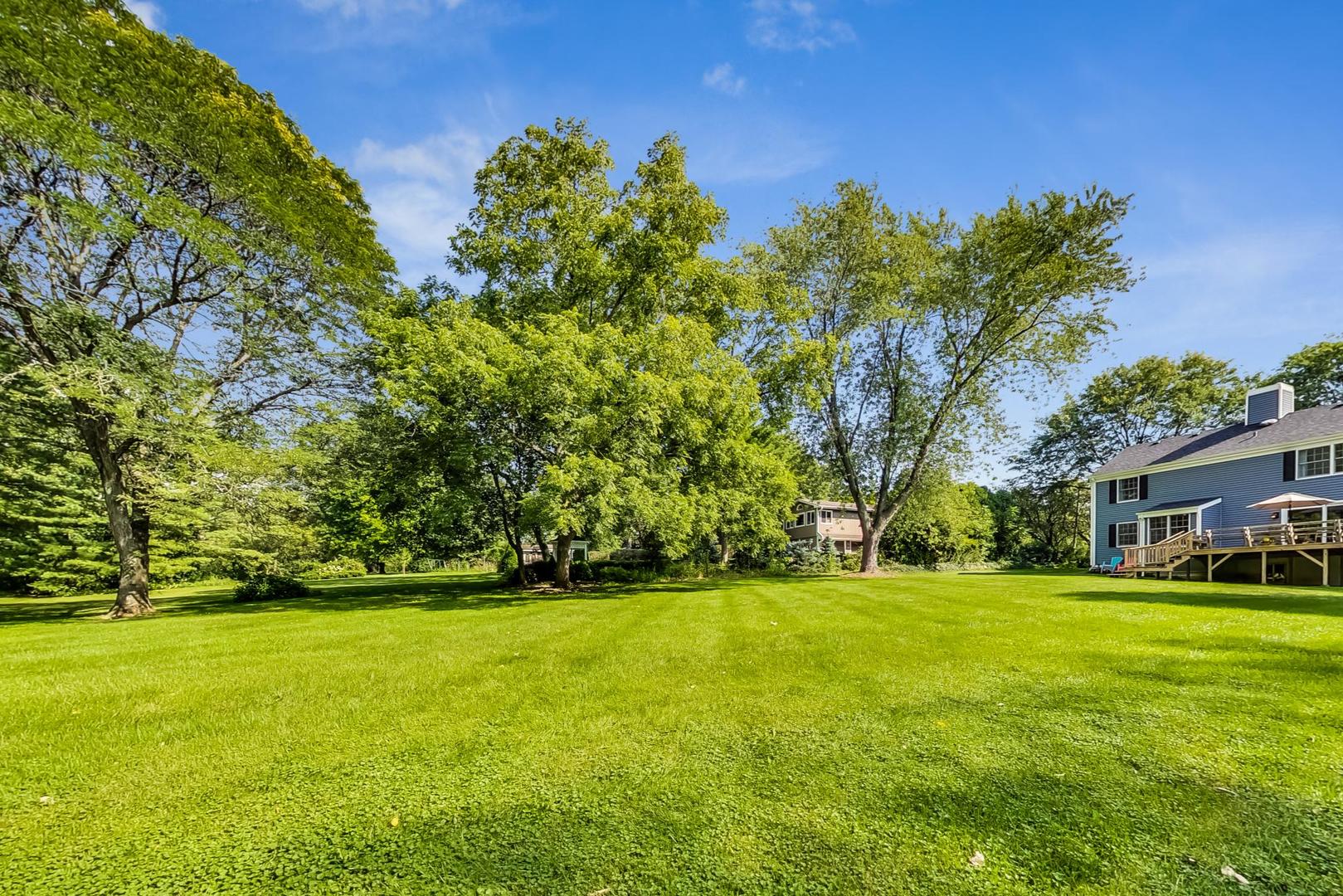 2210 Freeman Court Inverness, IL 60067 - Photo 54 of 56 a view of a yard with a house in the background