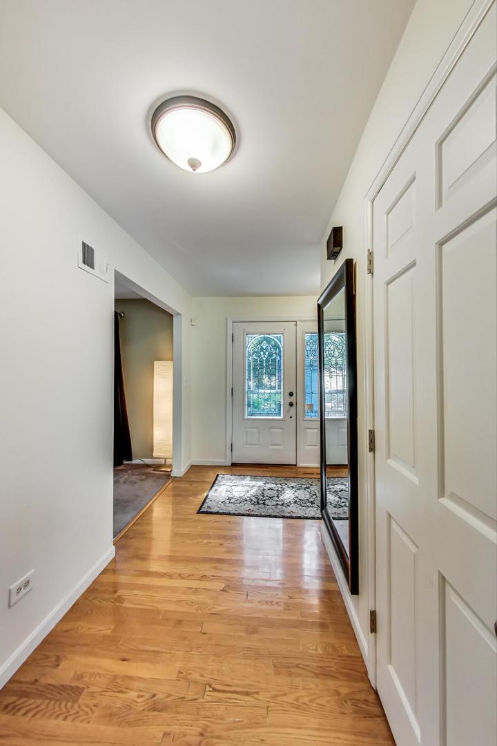 2210 Freeman Court Inverness, IL 60067 - Photo 6 of 56 a view of an entryway with wooden floor