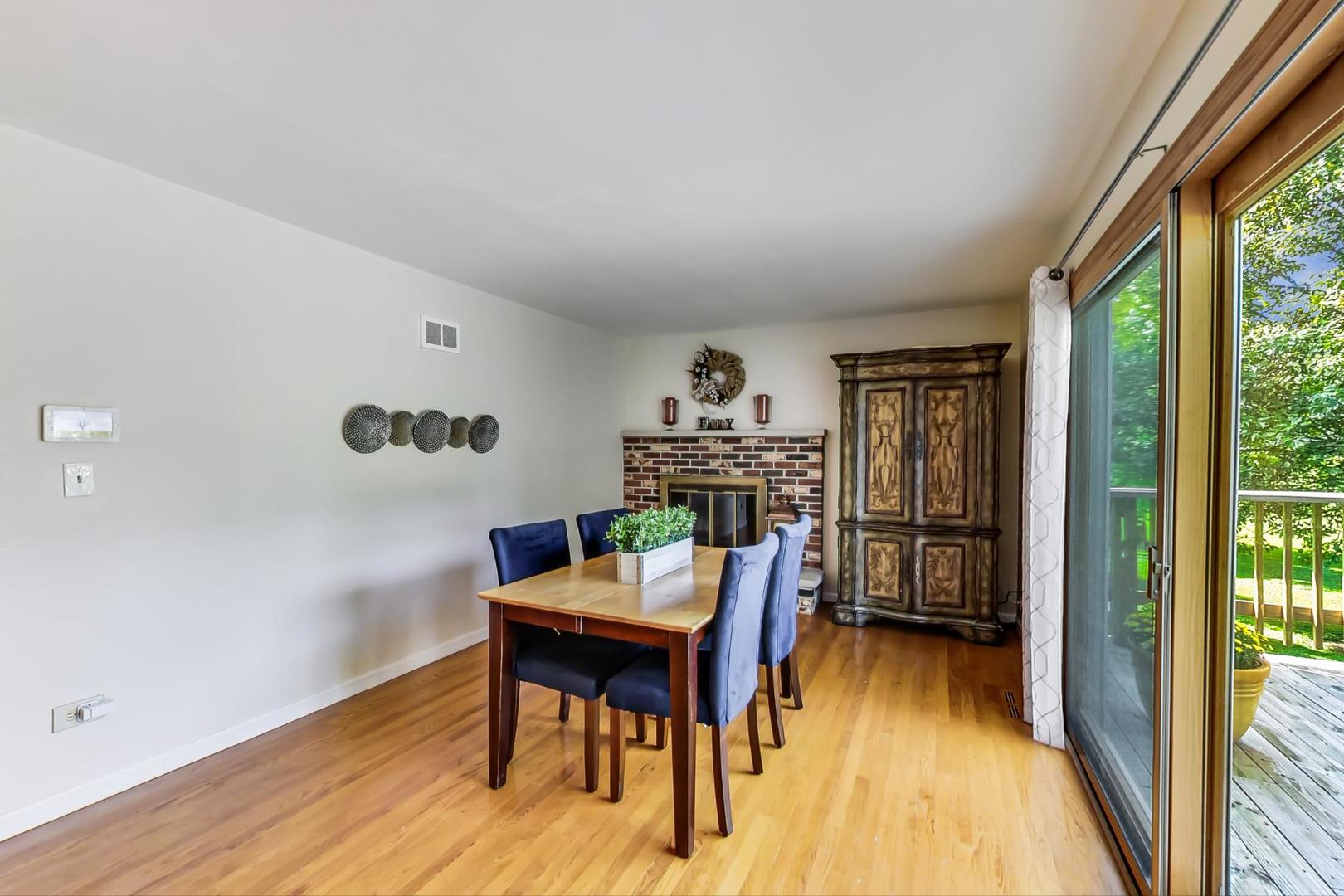 2210 Freeman Court Inverness, IL 60067 - Photo 10 of 56 a view of a dining room with furniture and wooden floor