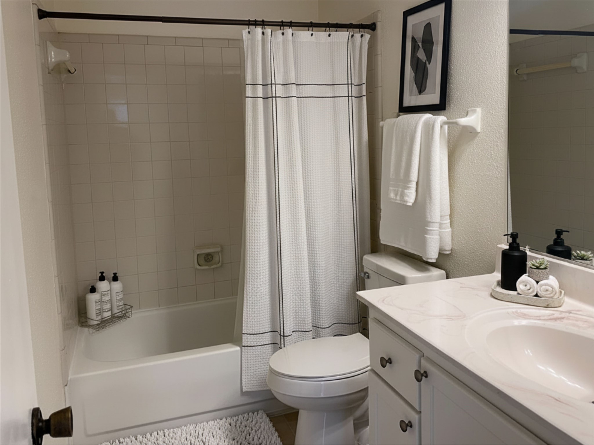 10859 Braes Bend Drive Houston, TX 77071 - Photo 5 of 7 a bathroom with a sink toilet and shower