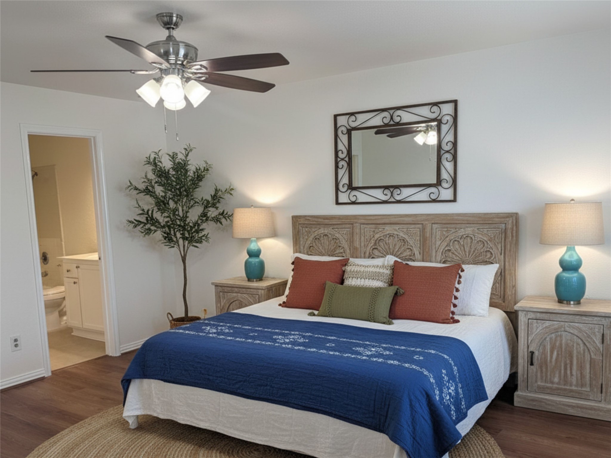 10859 Braes Bend Drive Houston, TX 77071 - Photo 6 of 7 a bedroom with a bed and a chandelier