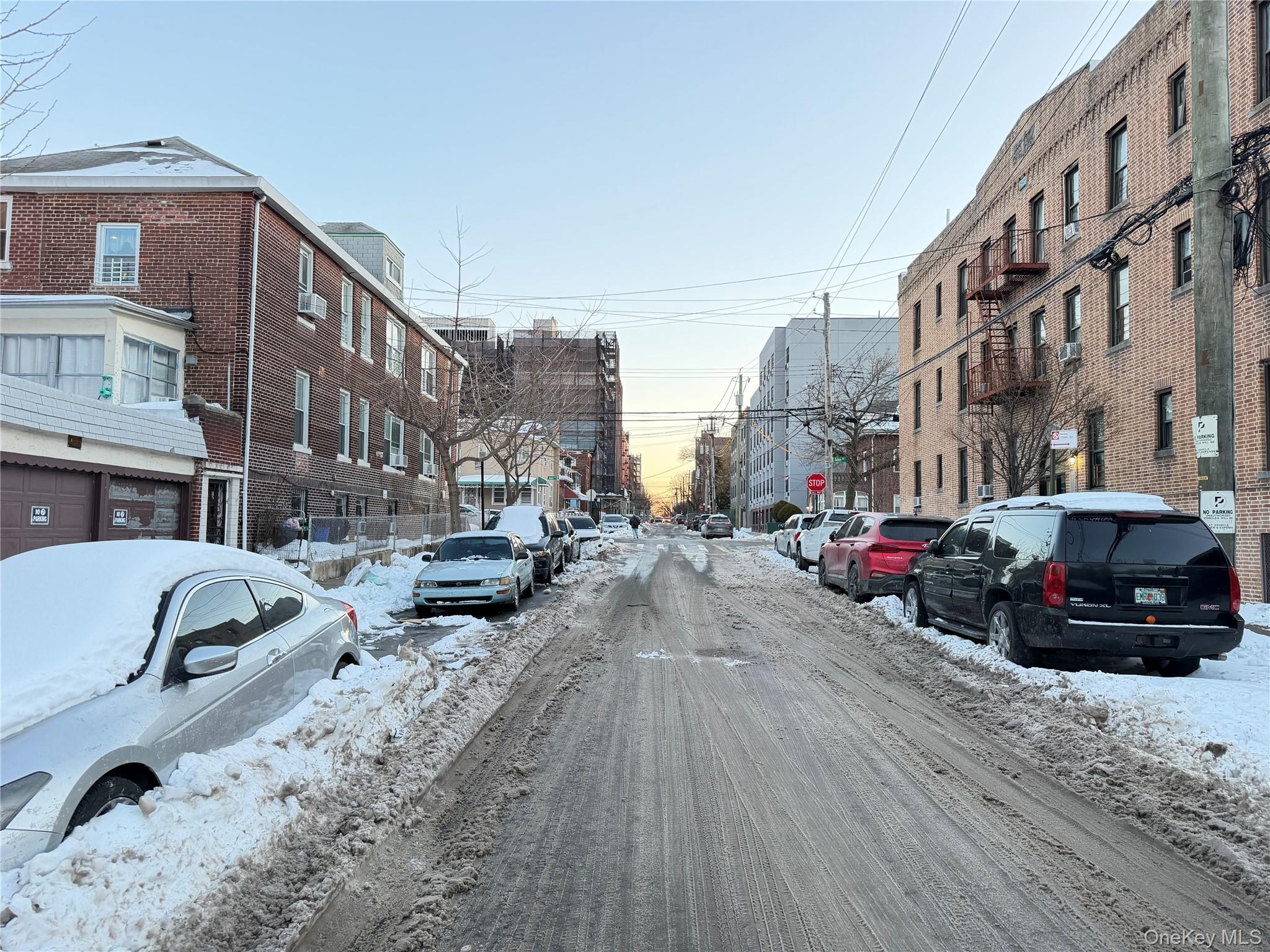 3012 Wallace Avenue Bronx, NY 10467 - Photo 2 of 3 a view of a city street with tall buildings