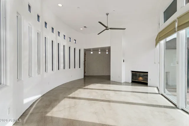 a kitchen with a sink and large window