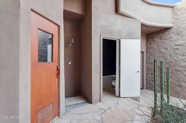 a view of a bathtub in the bathroom