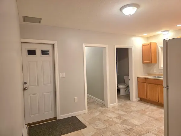 a view of a kitchen with a sink