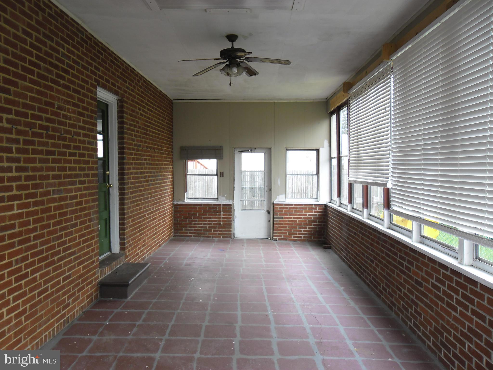 184 Riviera Drive Pasadena, MD 21122 - Photo 6 of 30 PORCH/SUNROOM ETC!