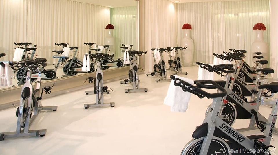 495 Brickell Avenue, Unit 1802 Miami, FL 33131 - Photo 24 of 30 a view of a room with gym equipment