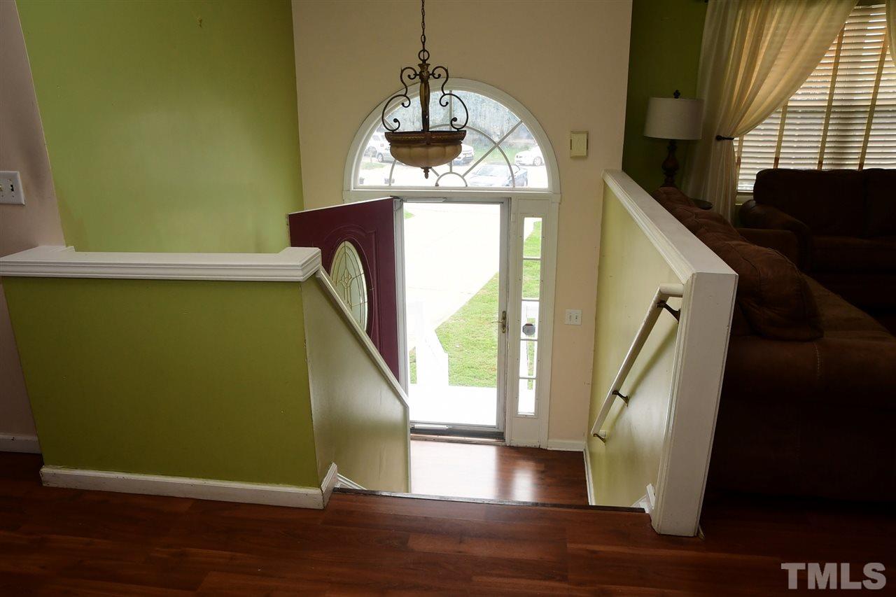 5600 Orchard Gate Way Raleigh, NC 27616 - Photo 6 of 19 a view of entryway and hall with wooden floor