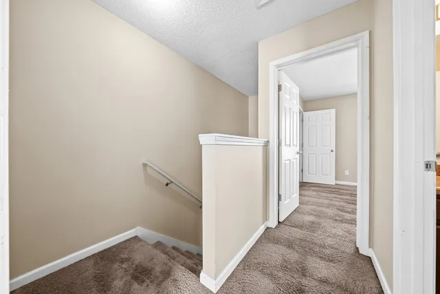 a view of a hallway with closet