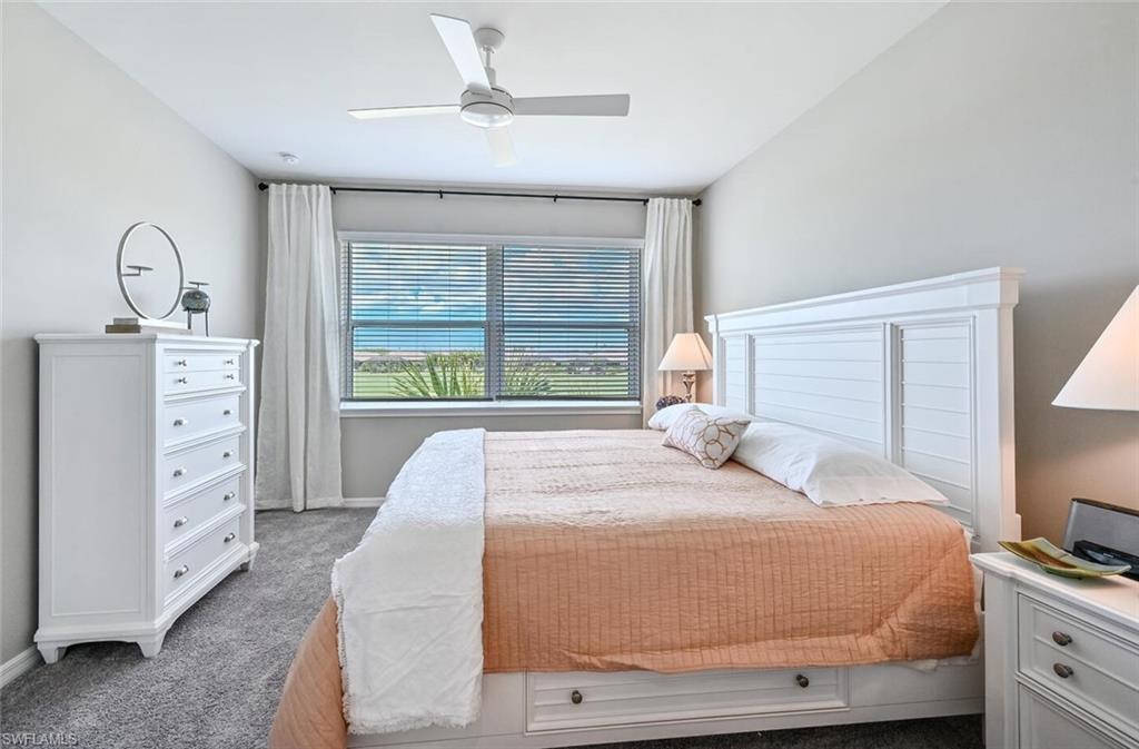 9389 Pocida Court, Unit 202 Naples, FL 34119 - Photo 15 of 38 Primary Suite (TV not pictured)
