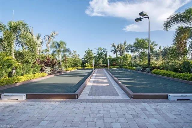 a view of a pathway with a yard