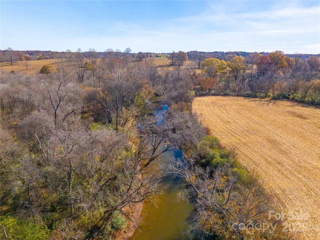a view of a lake with mountains in the background