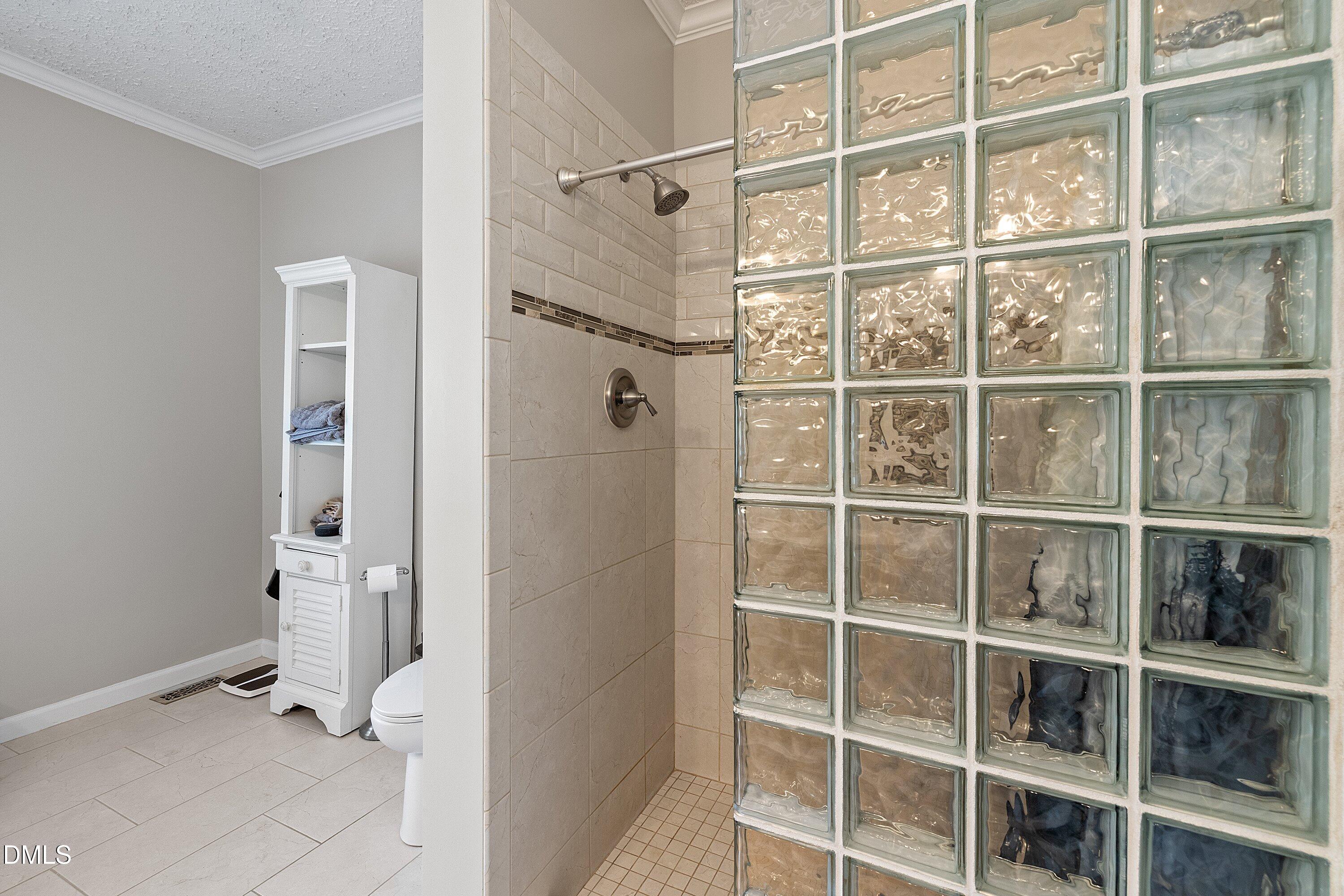 2265 Bud Lipscomb Road Willow Spring, NC 27592 - Photo 26 of 76 a view of a walk in closet