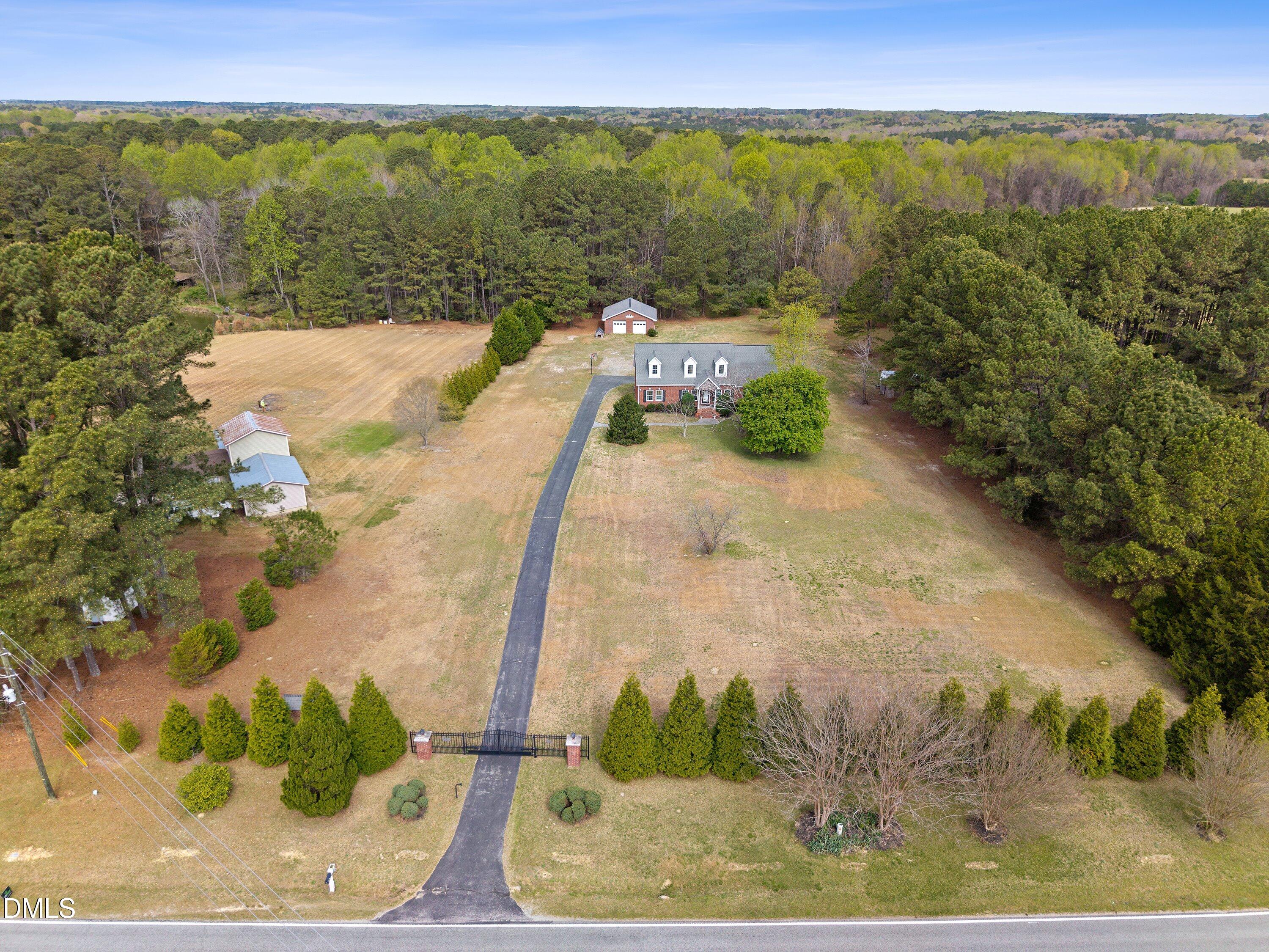 2265 Bud Lipscomb Road Willow Spring, NC 27592 - Photo 2 of 76 a view of a city