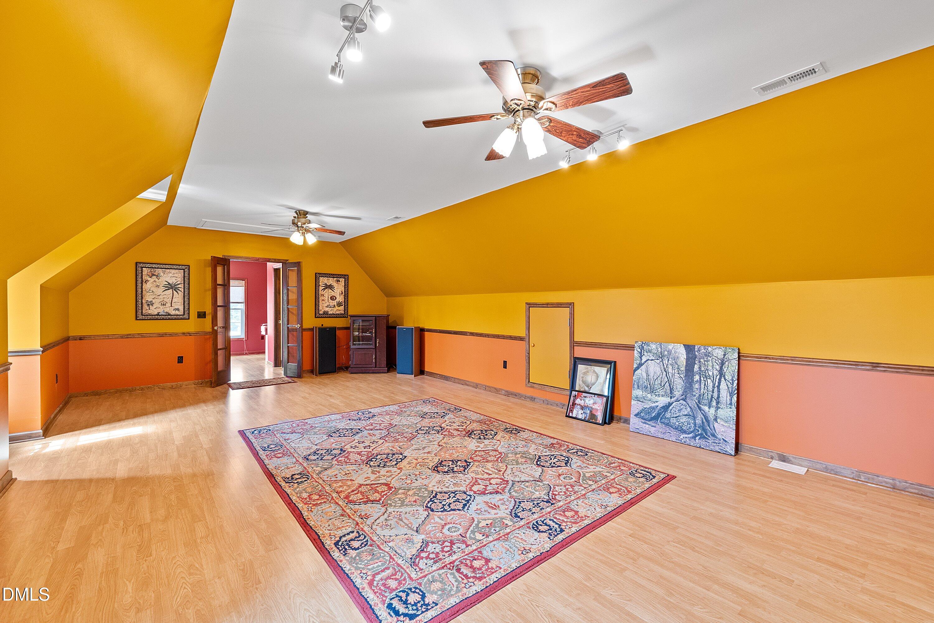 2265 Bud Lipscomb Road Willow Spring, NC 27592 - Photo 37 of 76 a bed room with a bed
