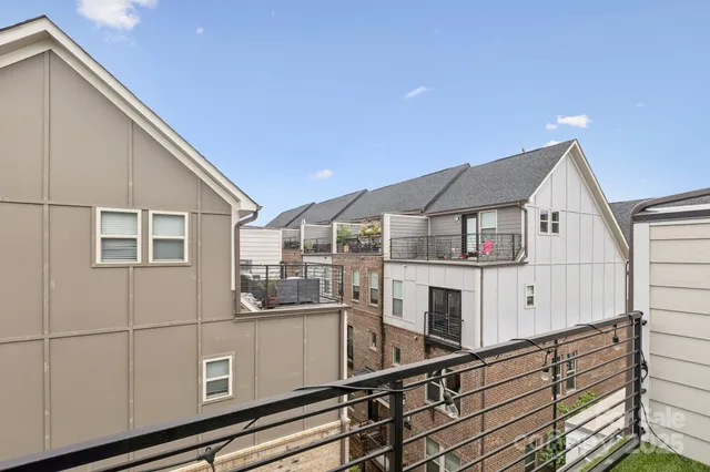 a front view of a building with garden