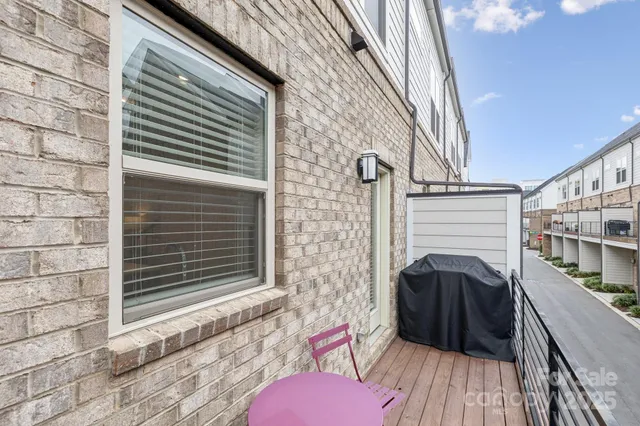 a view of a building with a street