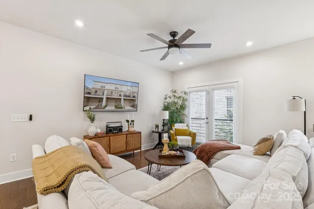 a living room with furniture and a window