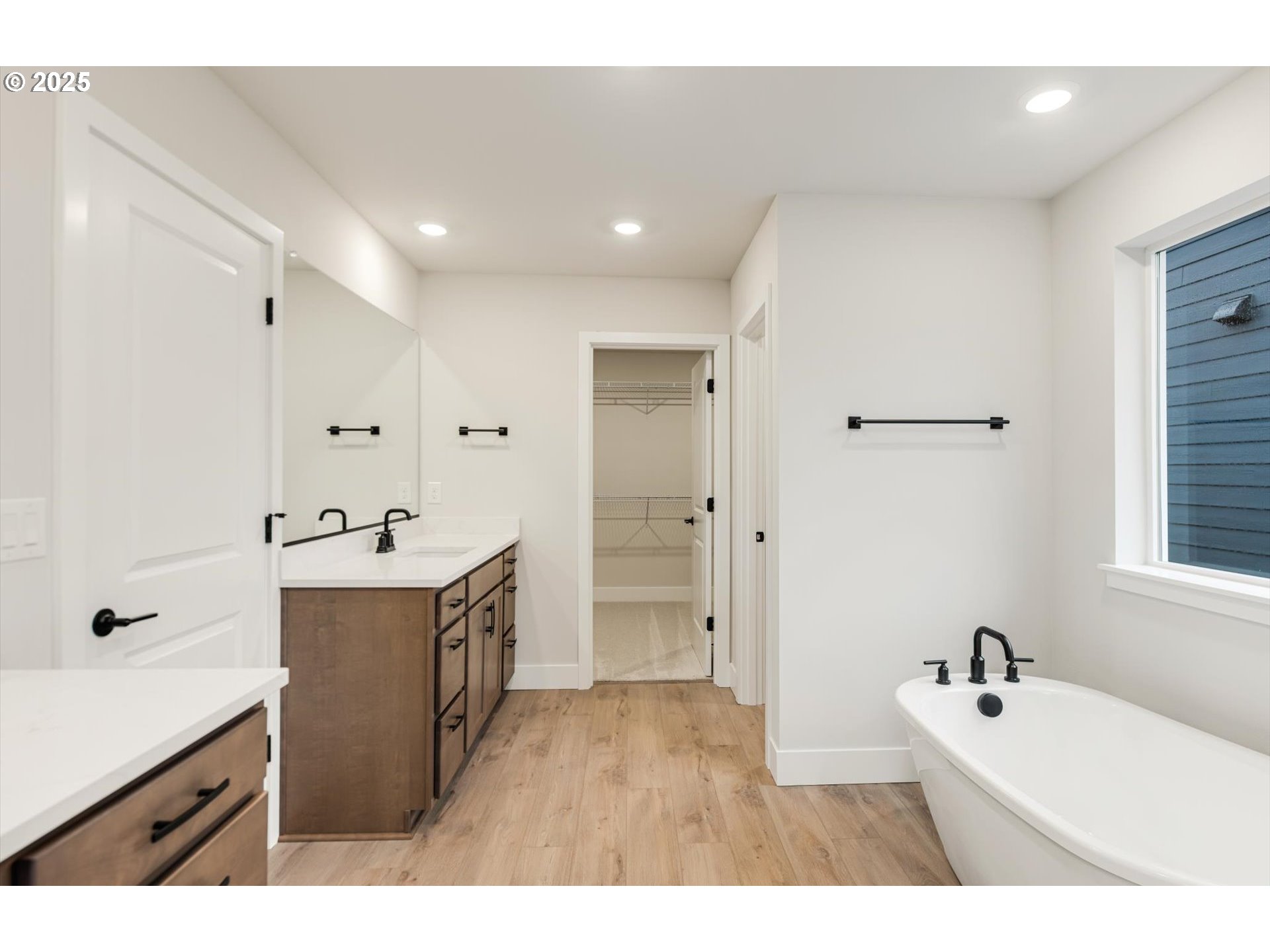8710 South 3rd Street Ridgefield, WA 98642 - Photo 17 of 22 a spacious bathroom with a tub sink and mirror