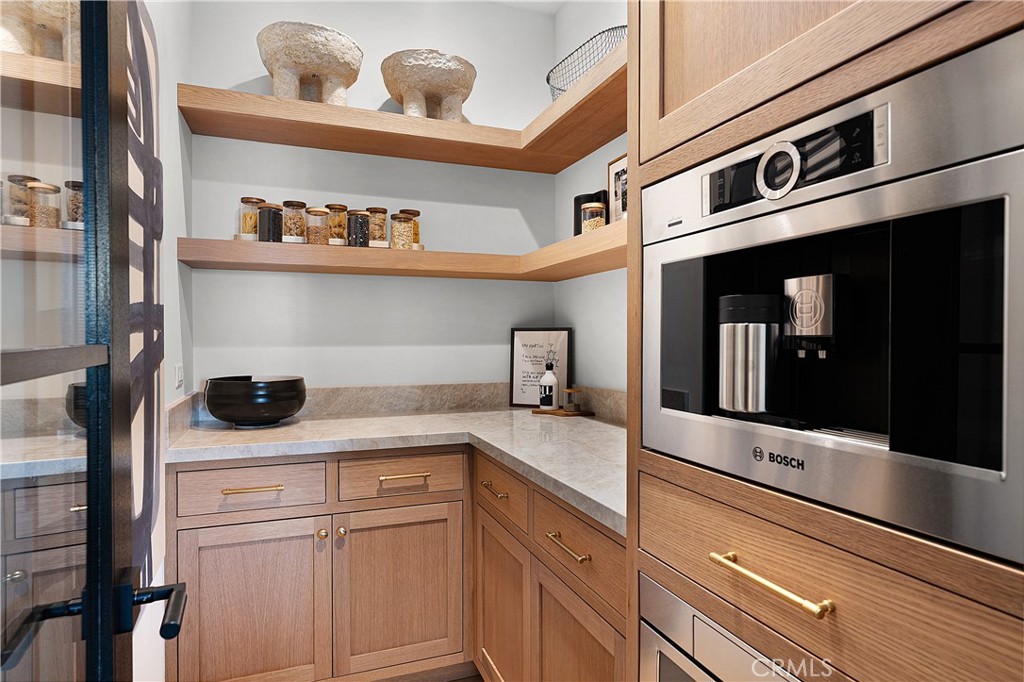 9348 Nine Bark Road Truckee, CA 96161 - Photo 29 of 58 a kitchen with white cabinets and white appliances
