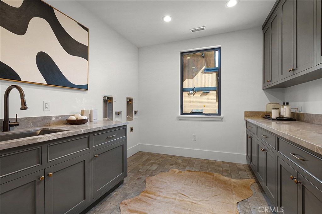 9348 Nine Bark Road Truckee, CA 96161 - Photo 33 of 58 a kitchen with sink and cabinets