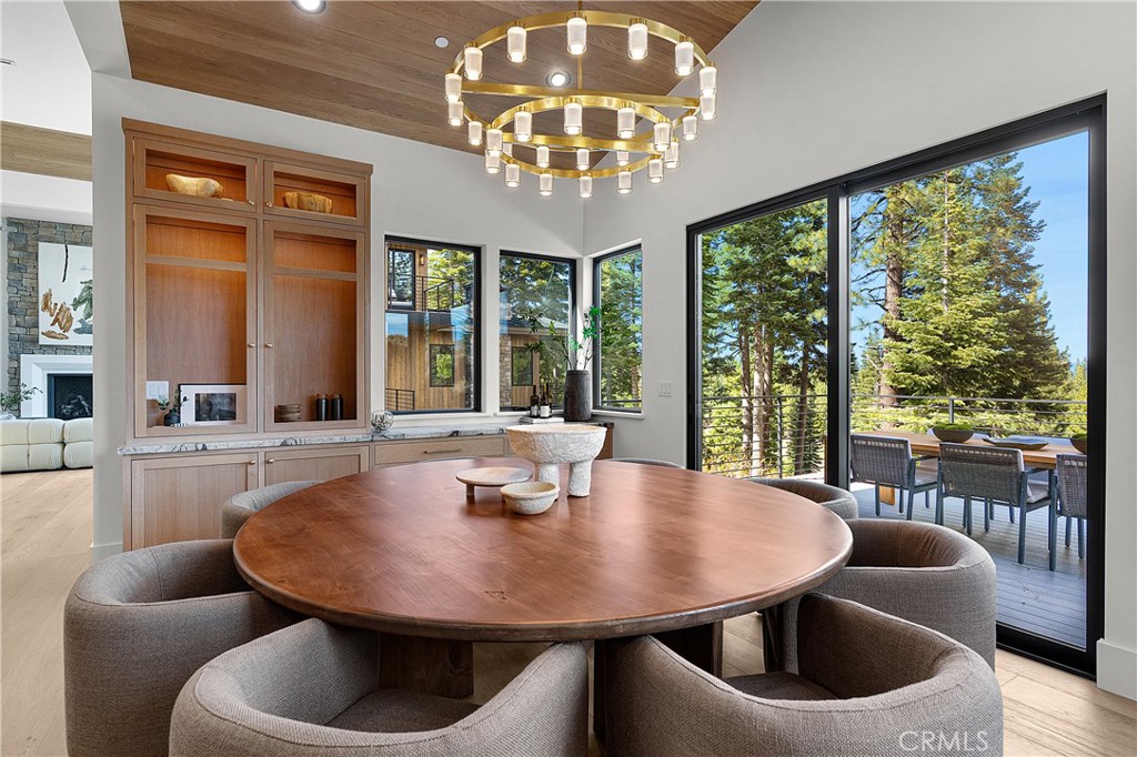 9348 Nine Bark Road Truckee, CA 96161 - Photo 37 of 58 a view of a dining room with furniture window and outside view