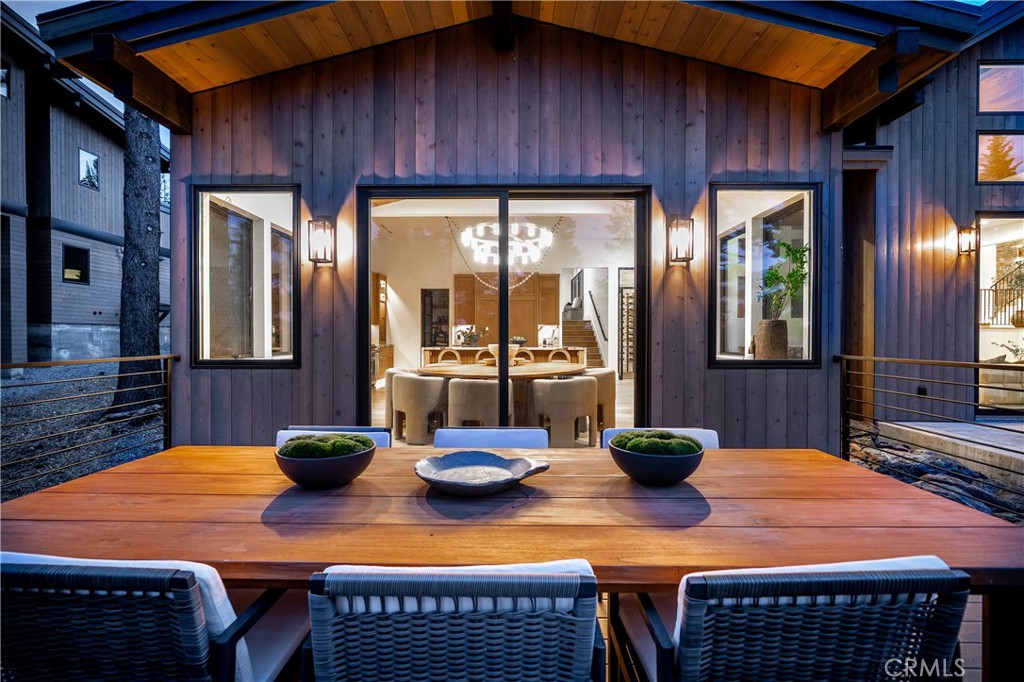 9348 Nine Bark Road Truckee, CA 96161 - Photo 48 of 58 a dining table with chairs and window