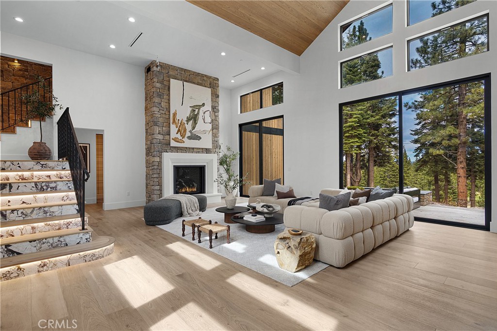 9348 Nine Bark Road Truckee, CA 96161 - Photo 10 of 58 a living room with furniture and large windows
