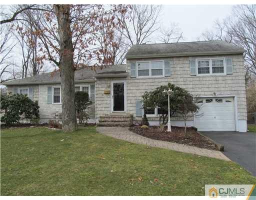 1 Timber Road East Brunswick, NJ 08816 - Photo 1 of 22 a view of a house with backyard and sitting area
