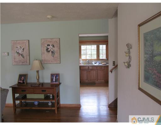 1 Timber Road East Brunswick, NJ 08816 - Photo 2 of 22 a view of a workspace with furniture and a window