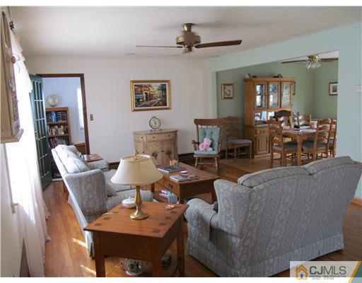 1 Timber Road East Brunswick, NJ 08816 - Photo 3 of 22 a living room with furniture and wooden floor