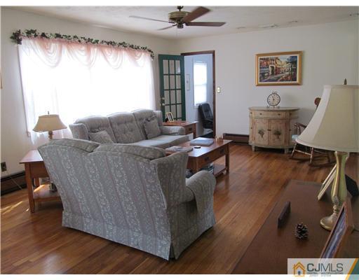 1 Timber Road East Brunswick, NJ 08816 - Photo 4 of 22 a living room with furniture and a window