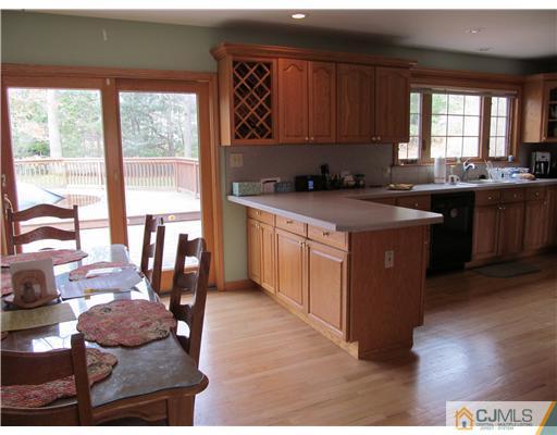 1 Timber Road East Brunswick, NJ 08816 - Photo 6 of 22 a kitchen with stainless steel appliances granite countertop a stove a sink and a microwave
