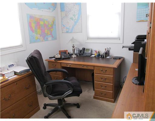 1 Timber Road East Brunswick, NJ 08816 - Photo 9 of 22 a view of a workspace with furniture and a window