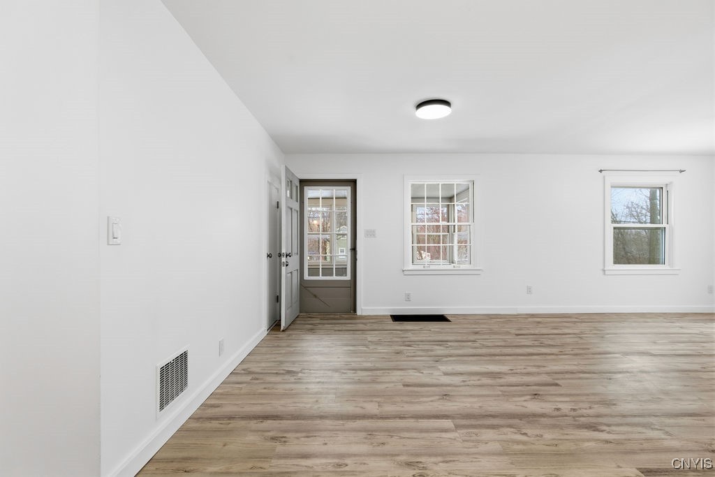 4548 Dublin Road Marcellus, NY 13108 - Photo 14 of 49 The door leads to the enclosed front porch.
