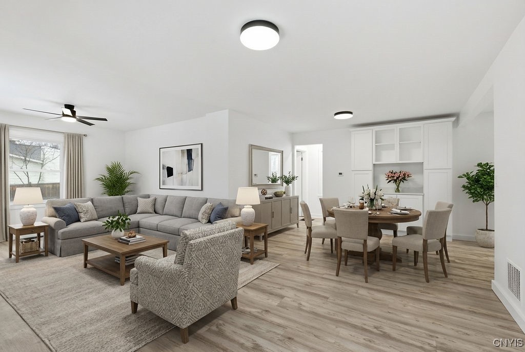 4548 Dublin Road Marcellus, NY 13108 - Photo 10 of 49 Virtually Staged Photo of the dining and family ro