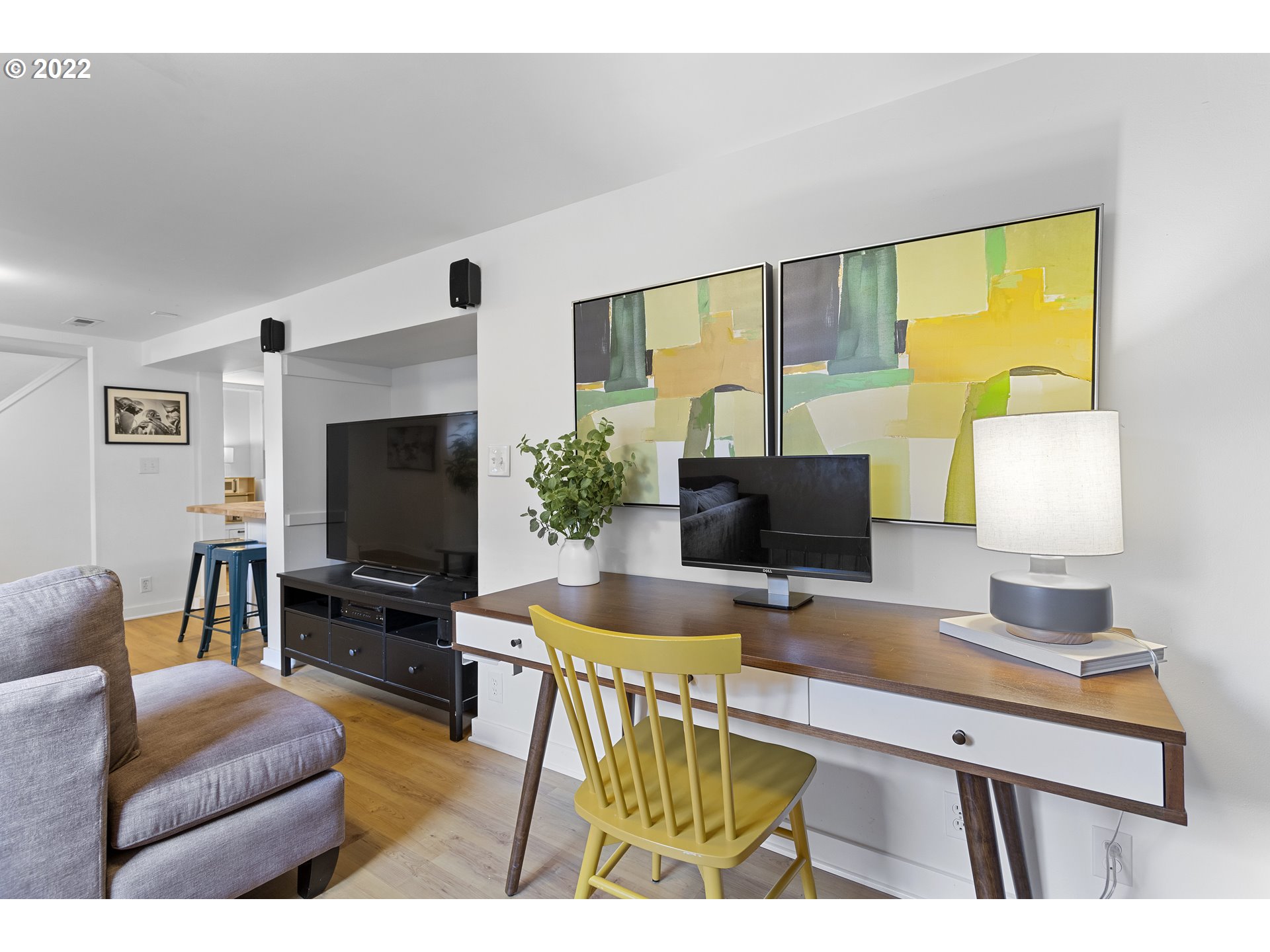 6429 North Commercial Avenue Portland, OR 97217 - Photo 24 of 32 a living room with furniture and a flat screen tv