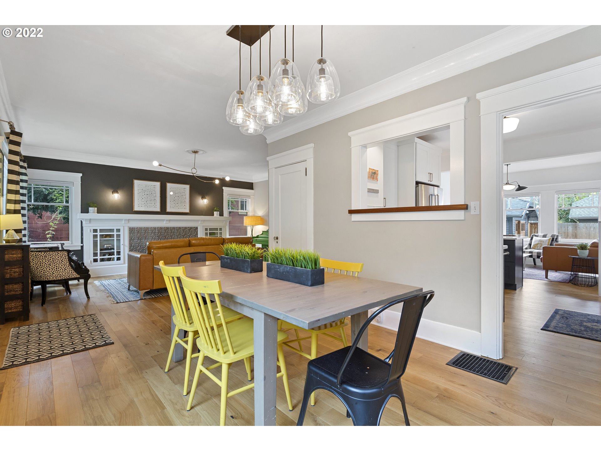 6429 North Commercial Avenue Portland, OR 97217 - Photo 6 of 32 a view of a dining room with furniture and wooden floor