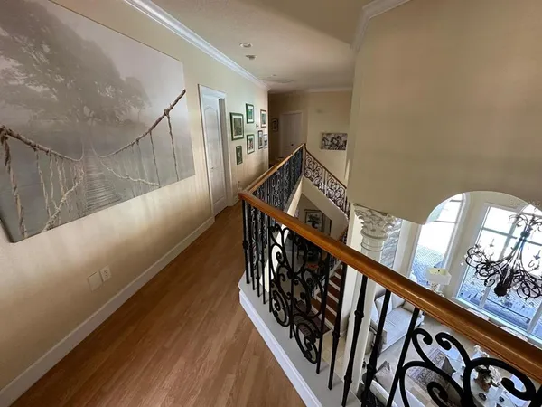 a view of a livingroom with furniture and workspace