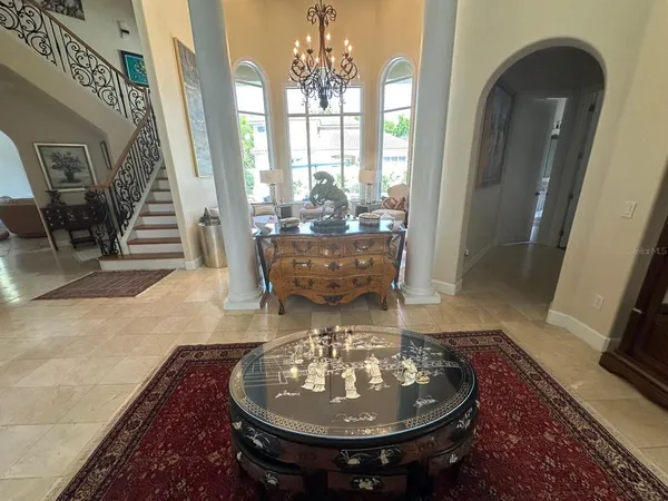 a view of a entryway door with wooden floor