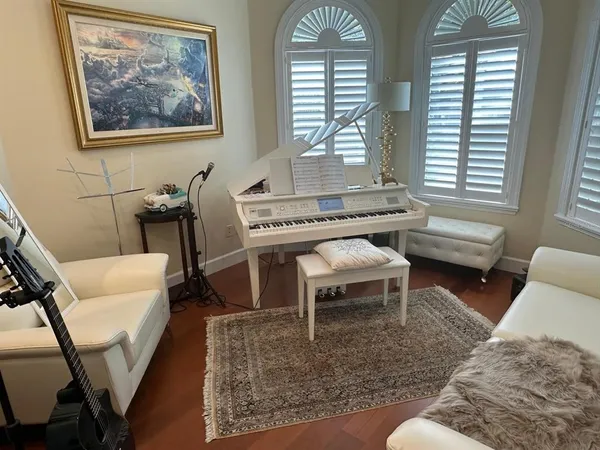 a living room with furniture and a window