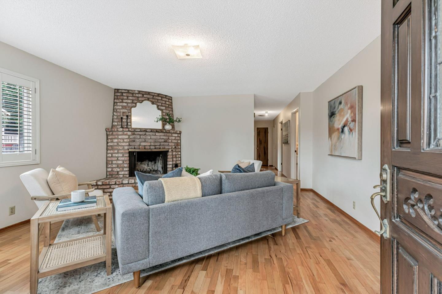 801 Lobos Street Monterey, CA 93940 - Photo 2 of 43 a living room with furniture and a fireplace