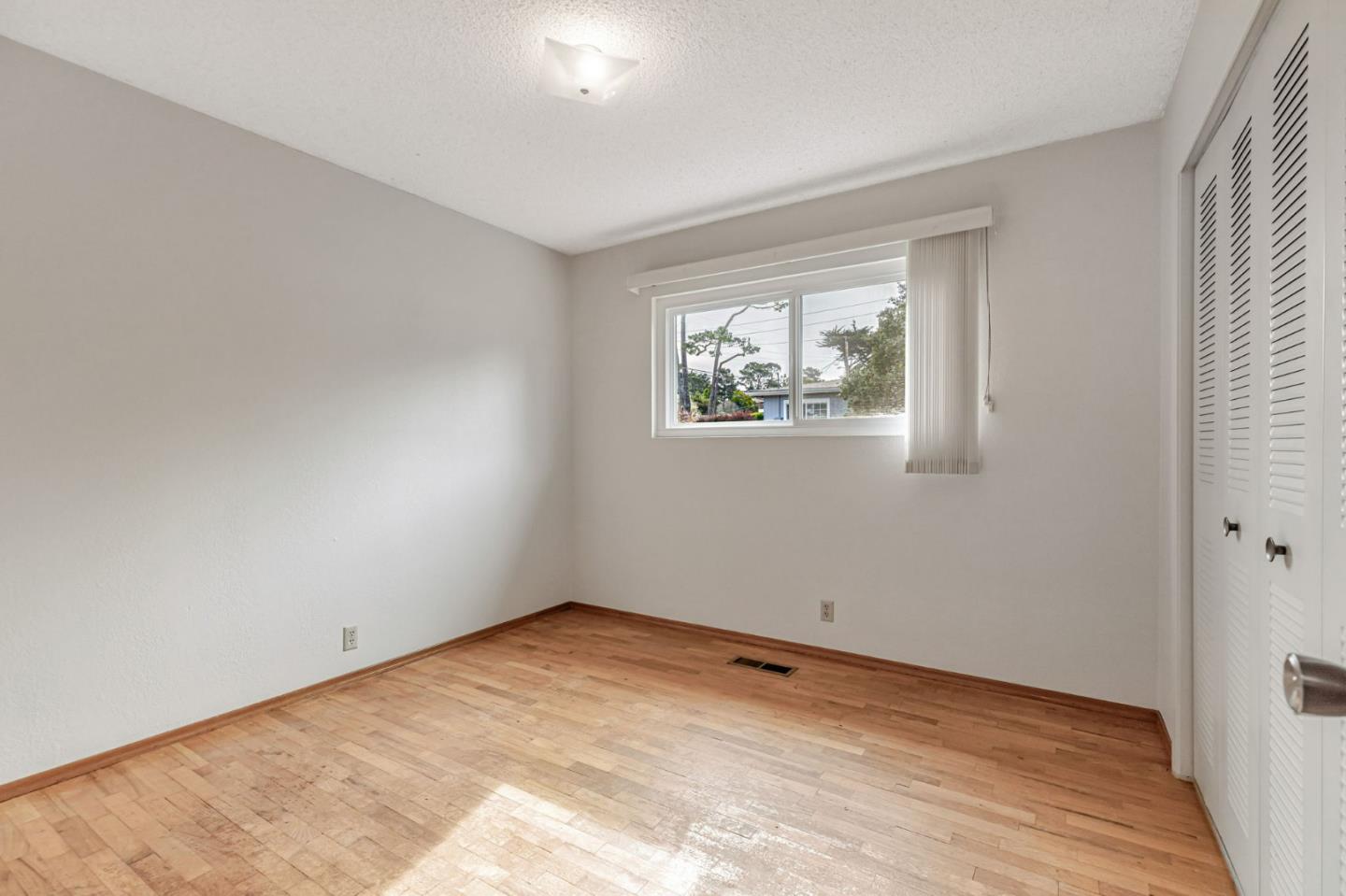 801 Lobos Street Monterey, CA 93940 - Photo 21 of 43 an empty room with windows