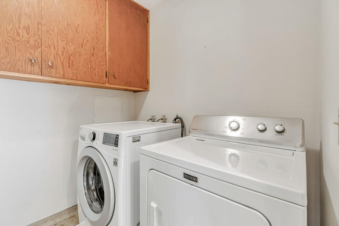 801 Lobos Street Monterey, CA 93940 - Photo 30 of 43 a utility room with dryer and washer