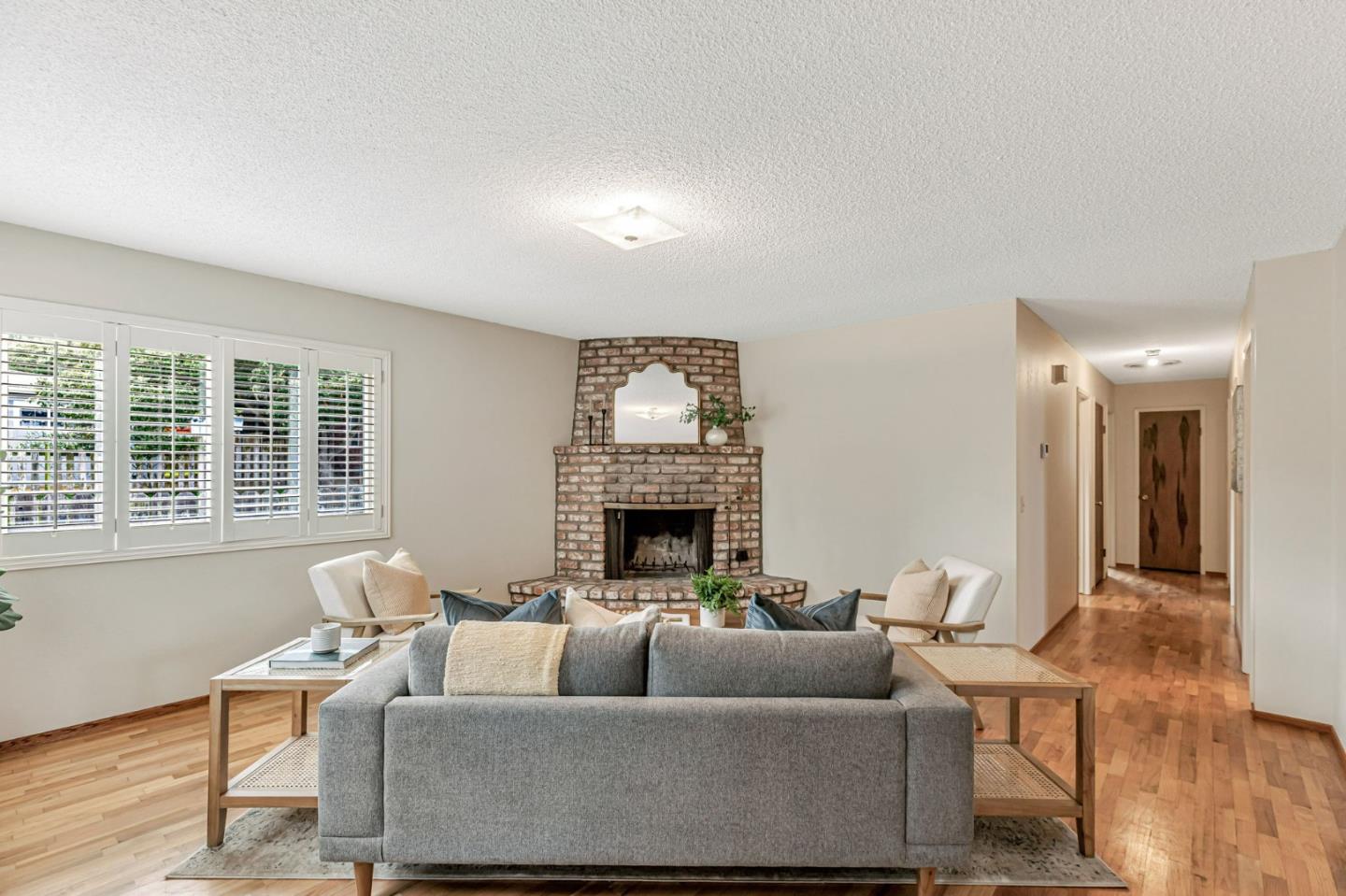 801 Lobos Street Monterey, CA 93940 - Photo 3 of 43 a living room with furniture and a fireplace