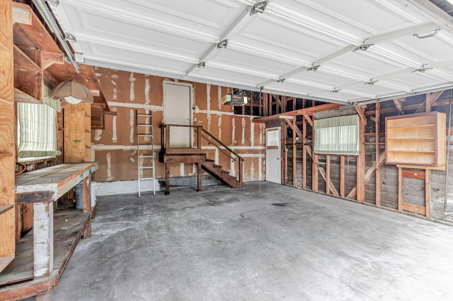 801 Lobos Street Monterey, CA 93940 - Photo 32 of 43 a view of an empty room with stairs