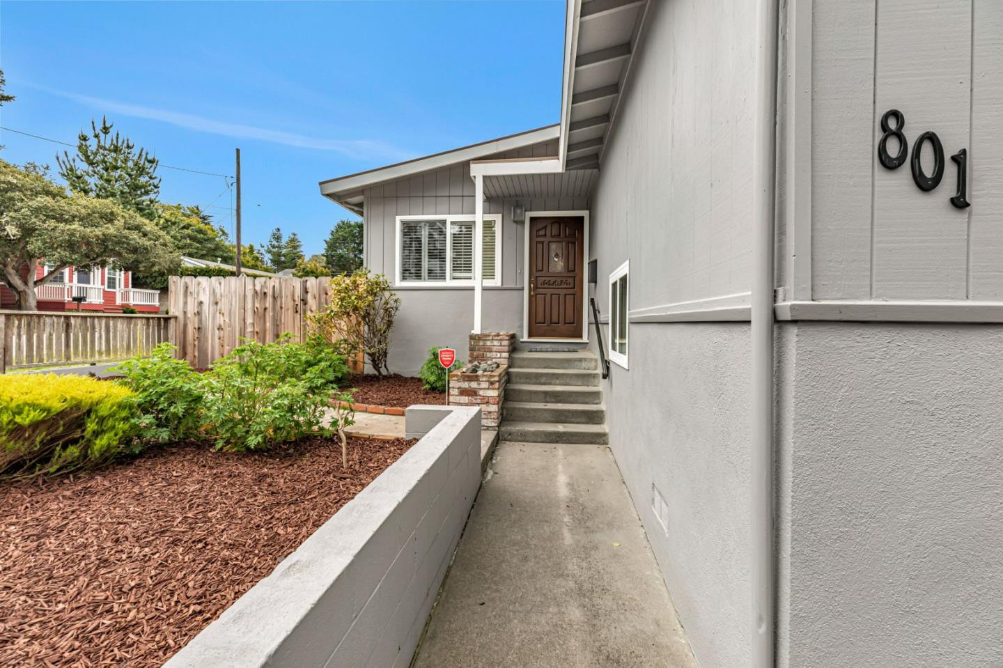 801 Lobos Street Monterey, CA 93940 - Photo 34 of 43 a view of a house with backyard and sitting area
